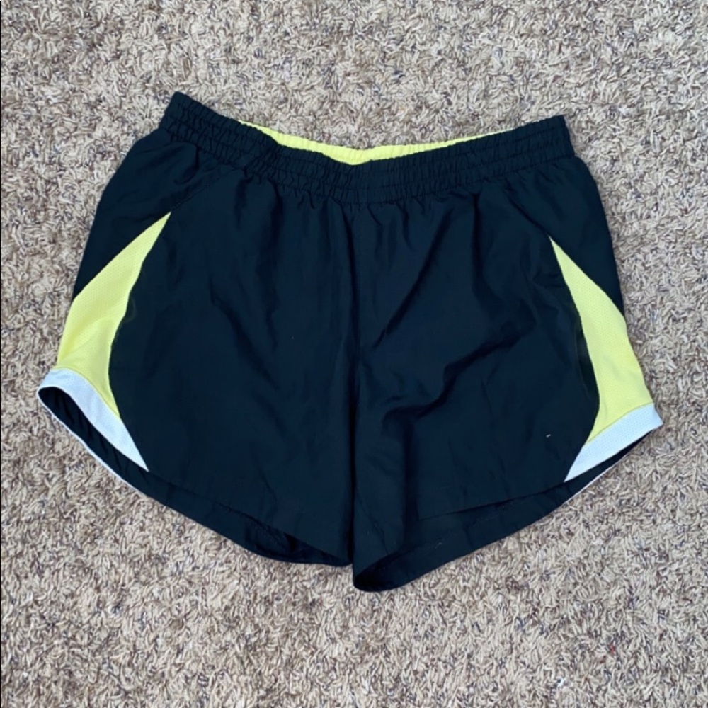 Black and yellow Nike shorts